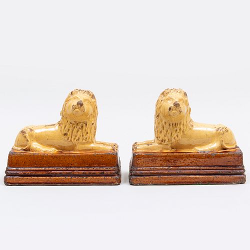 Pair of English Salt Glazed Earthenware Models of Lions