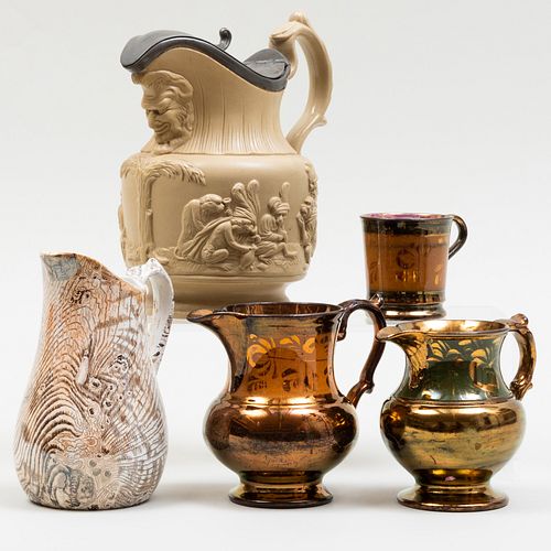 Group of Four Pitchers and a Mug
