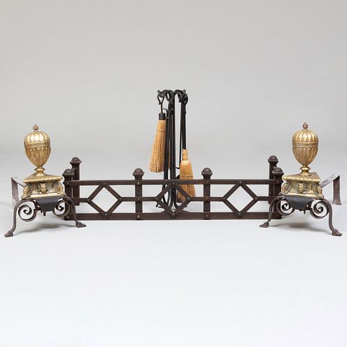 Pair of Mannerist Style Brass Gadrooned Andirons with Rustic Wrought Iron Fire Fender and Tools