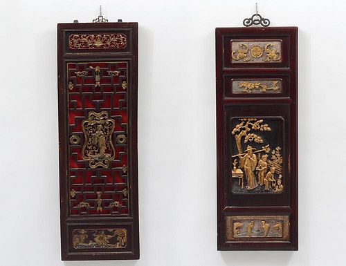 TWO CARVED, GILT AND PAINTED WOOD PANELS