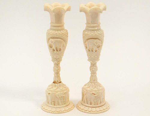 PAIR OF CARVED IVORY CANDLE HOLDERS