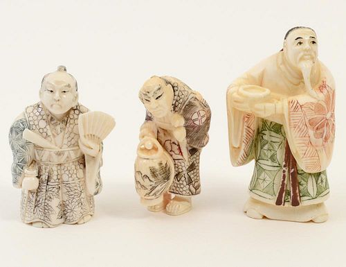 GROUP OF THREE CARVED IVORY NETSUKES/STUDIES