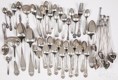 Sterling silver flatware and three coin spoons
