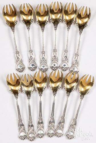 Twelve Tiffany & Co. sterling grapefruit spoons
