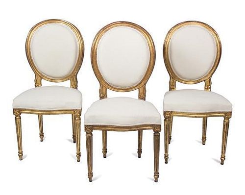A Set of Eight Louis XVI Style Giltwood Dining Chairs Height 40 inches.