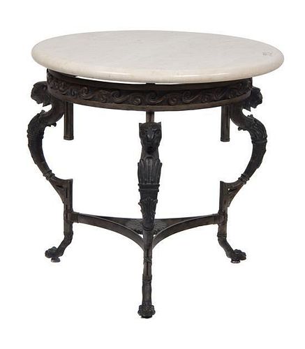 A Neo-Classical Bronze and Marble Top Table Height 23 1/4 x diameter 24 inches.