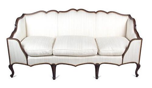 A Louis XV Style Mahogany Canape Height 36 x width 76 x depth 29 inches; seat cushion depth 21 1/4 inches.