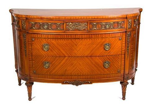 A Louis XVI Style Gilt Metal Mounted Parquetry Commode Height 35 1/4 x width 56 x depth 24 inches.