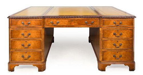 A George II Walnut Partner's Desk Height 31 x width 47 x length 72 inches.
