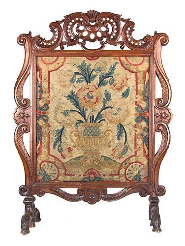 An Epoque Regence Wooden Fire Screen with Needlepoint Height 41 1/2 x width 31 inches.
