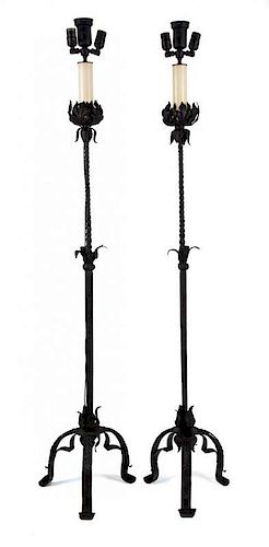 A Pair of Wrought Iron Three-Light Torcheres Height 73 1/2 inches.