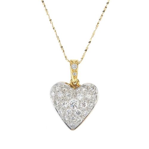 An 18ct gold diamond pendant. The pave-set brilliant-cut diamond heart, to the similarly-cut diamond