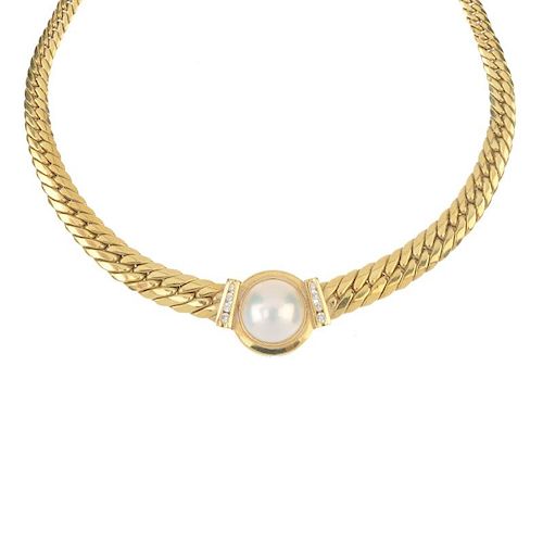 A mabe pearl and diamond collar. The mabe pearl, with brilliant-cut diamond line sides, to the taper