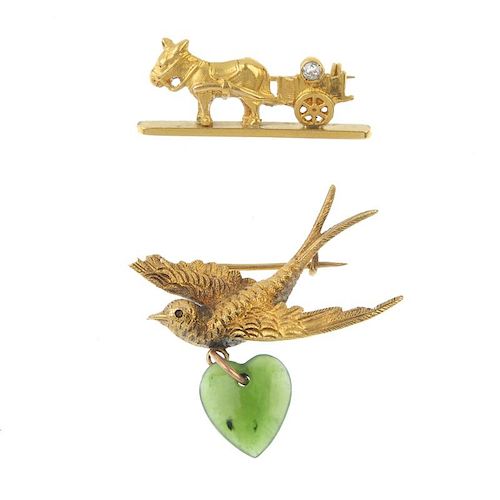 Two early 20th century gold gem-set brooches. To include a 15ct gold swallow brooch with suspended n