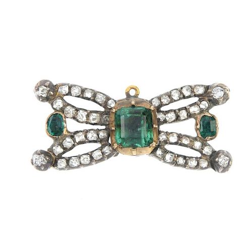 A mid 19th century emerald and diamond jewellery component. The rectangular-shape emerald collet, wi