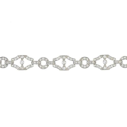 A diamond bracelet. Of openwork design, the old and single-cut diamond hexagonal links, with similar