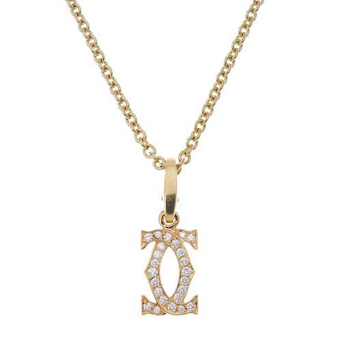 CARTIER - an 18ct gold diamond pendant. Designed as two brilliant-cut diamond crossover C's, suspend