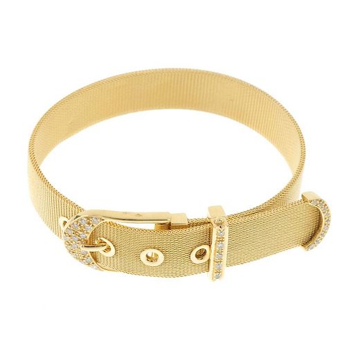 A diamond belt bracelet. The mesh-link bracelet, to the pave-set brilliant-cut diamond buckle clasp.