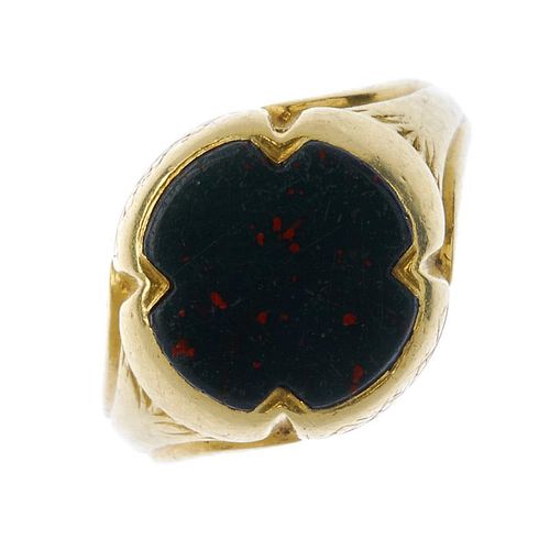 A gentleman's mid 19th century 18ct gold bloodstone signet ring. The scalloped edge bloodstone, to t