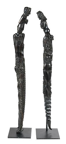 Two Carved Wood Figural Swords