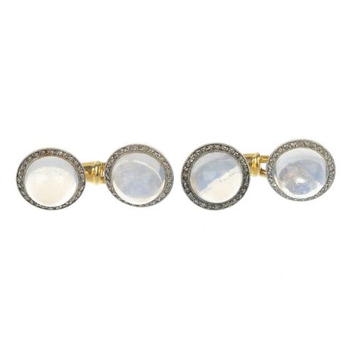 A pair of early 20th century moonstone and diamond cufflinks. Each designed as a circular moonstone