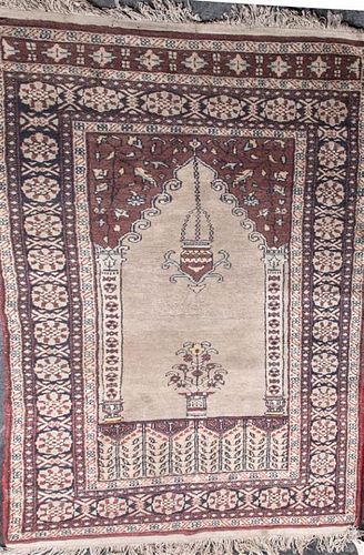 A Persian Prayer Rug, 5 feet x 3 feet 1 inch.