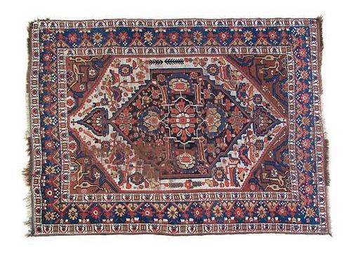 An Isfahan Wool Rug, CIRCA 1900, 6 feet 4 inches x 5 feet 3 inches.