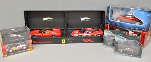 Corgi MG racing cars, scale 1:18, a Solido Mini Cooper, a Ferrari and other cars