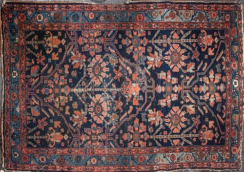 A Persian Wool Rug, 6 feet x 3 feet 5 inches.