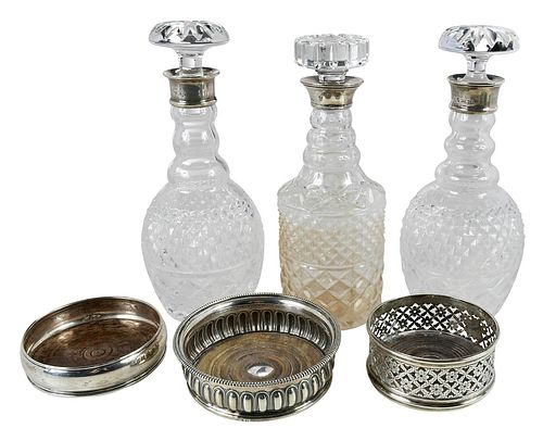 Three Silver Wine Coasters and Silver Mounted Decanters