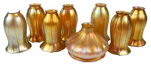 Eight Quezal and Steuben Iridescent Gold Glass Shades