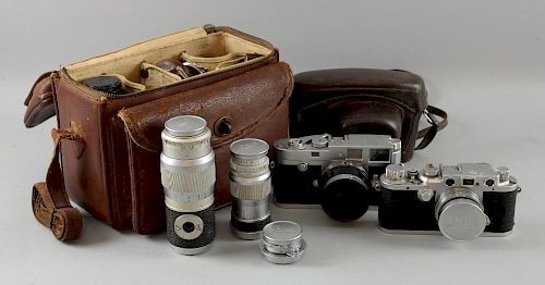 Leica Camera Collection including Leica camera body M2 946415, Leica camera body Nr 450984, Leica le