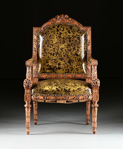 AN ITALIAN NEOCLASSICAL STYLE LEATHER UPHOLSTERED PARCEL GILT AND CARVED WOOD "CORNUCOPIA" ARMCHAIR,