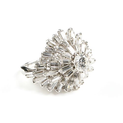 A LADY'S PLATINUM AND DIAMOND "BALLERINA" CLUSTER COCKTAIL RING, 1960s,