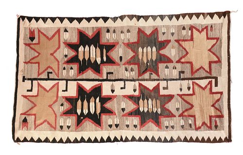 A DINÉ/NAVAJO PICTORIAL RUG WEAVING, "STAR AND FEATHER," PROBABLY NEW MEXICO, 1930s,