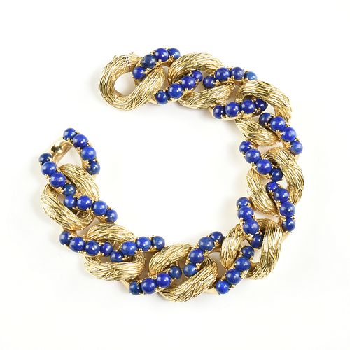 A VAN CLEEF & ARPELS 18K YELLOW GOLD AND LAPIS LAZULI CURB CHAIN BRACELET, BIRD'S NEST AND EGGS,