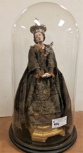 19TH C SPANISH OR ITALIAN WOODEN SAINT IN ELABORATELY EMBROIDERES DRESS 19 1/2" UNDER A GLASS DOME 25"H X 12"DIAM