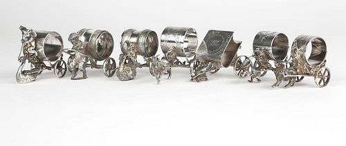 7 Victorian silver-plated carriage napkin rings