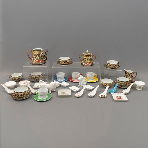 Lote de artículos de mesa. Francia, Inglaterra, Taiwán y Tailandia. SXX. Elaborados en cerámica y porcelana. Piezas: 42