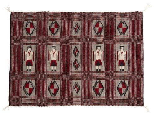 A Navajo Two-Faced Yei saddle blanket