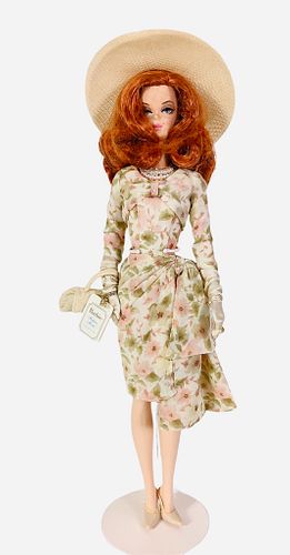 Barbie from the BFMC collection called A Day At The Races. This Barbie has a Genuine Silkstone body and is a Gold Label Barbie. She is wearing a beaut