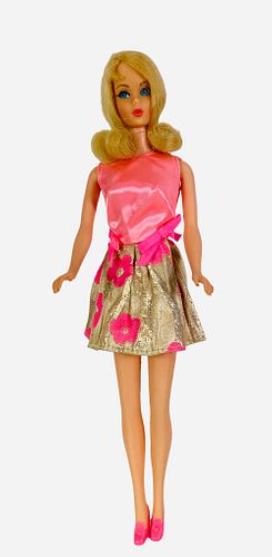 Blonde Marlo Flip TNT Barbie. Dressed in #3404 "Glowin' Out", hair and facial paint good, dress is bright, knee joints work well (three clicks).
