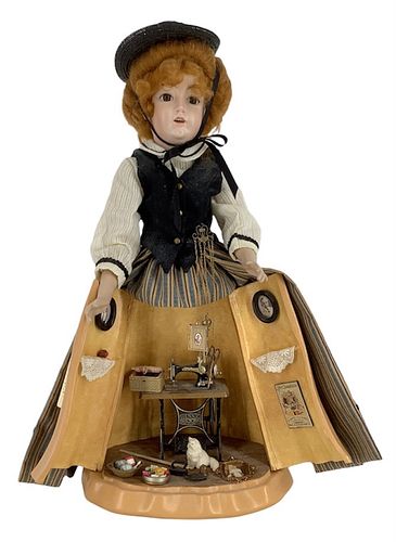 16" Porcelain doll with surprise skirt with miniature doll items.