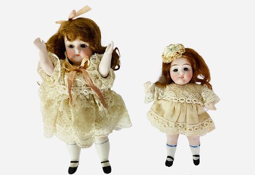 (2) small All-Bisque dolls. Includes 5 1/4" and 7" with one-piece heads/torsos, string jointed arms and legs, mohair wigs, glass eyes, molded and pain