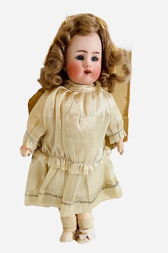 Carl Hartmann Globe Baby. 8 1/2" bisque socket head doll with mohair wig, glass sleep eyes, open mouth with teeth, on jointed composition body. All or