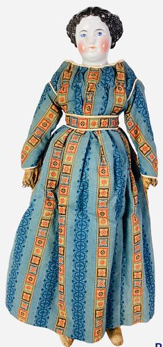 China shoulder head lady. 20" doll with molded and painted flattop hairstyle and facial features, on stitch-jointed cloth body with leather lower arms