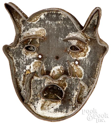 Pennsylvania tin devil head cookie cutter, 19th c.
