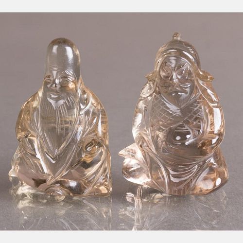 Two Chinese Carved Rock Crystal Figures.