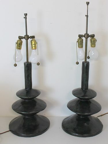 After Giacometti Pair Of Patinated Bronze Lamps.
