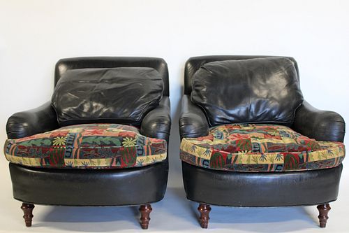 A Vintage And Quality Pair Of Leather Club Chairs